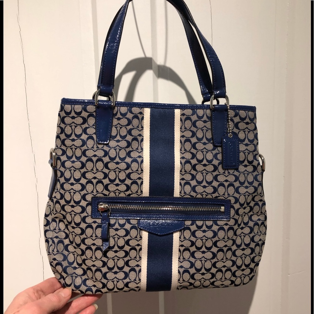 Coach signature messenger bag.